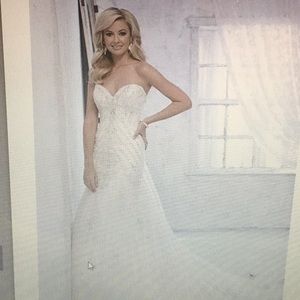 Strapless sweetheart fit and flare wedding gown